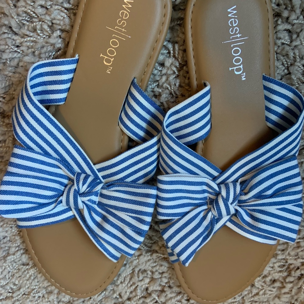 West Loop size 5/6 bow sandals. Worn once.